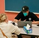 FEMA Staff Help People Apply for Assistance