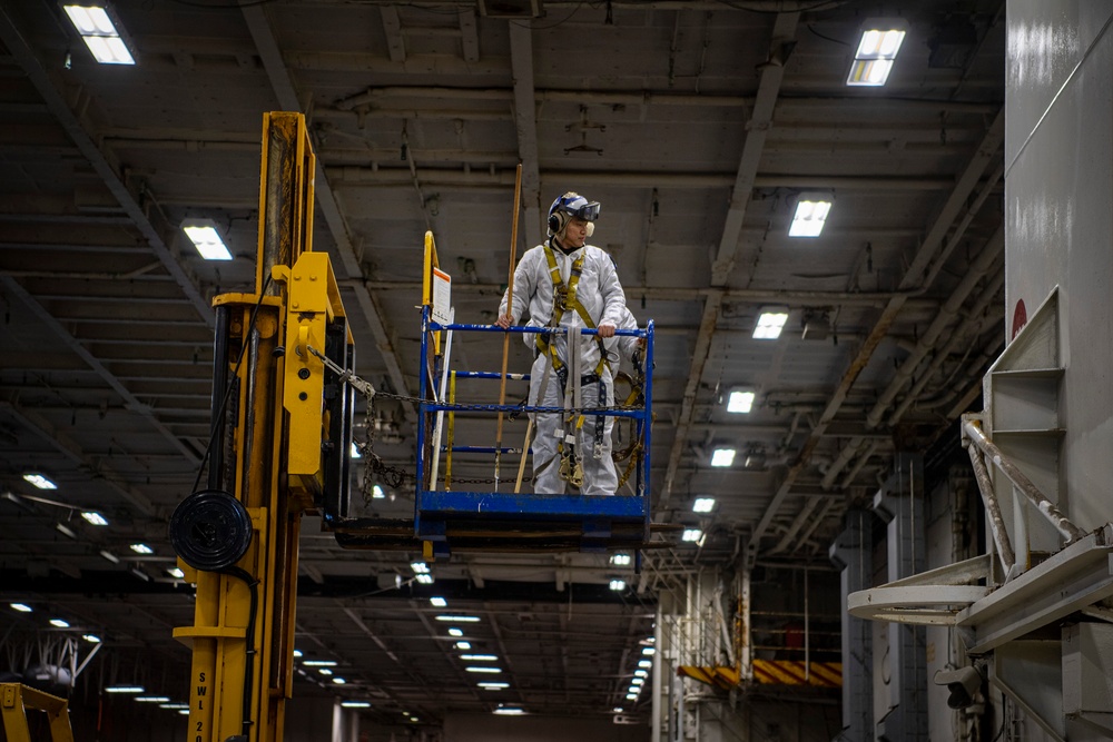 Nimitz Sailors Paint the Hangar Bay