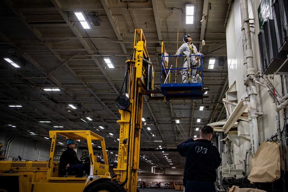 Nimitz Sailors Paint the Hangar Bay