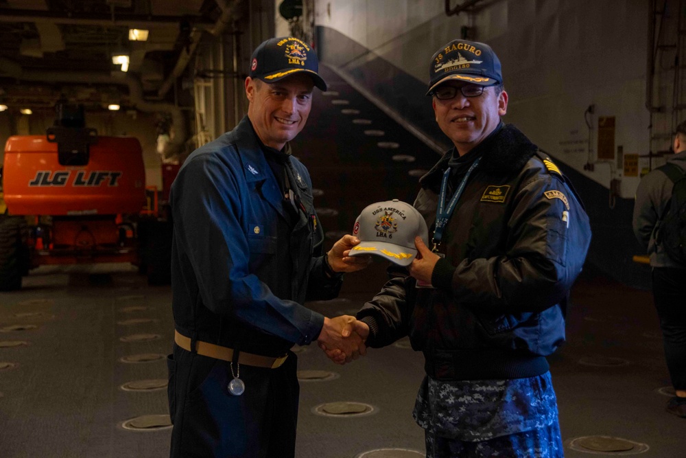 Sailors from JS Haguro (DDG 180) tour the USS America (LHA 6)