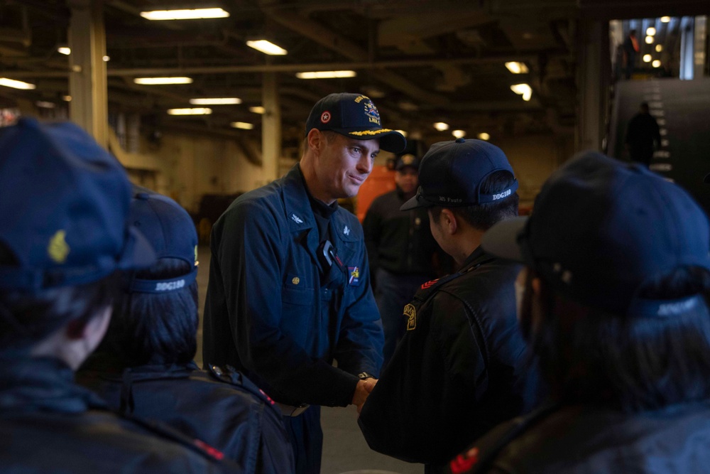 Sailors from JS Haguro (DDG 180) tour the USS America (LHA 6)