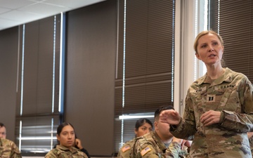 U.S. Army Reserve Capt. Alexandra Wiak conducts a class on Nutrition.