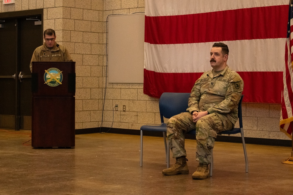 Uncasing the Colors: Washington National Guard military police detachment returns from Spartan Shield deployment.