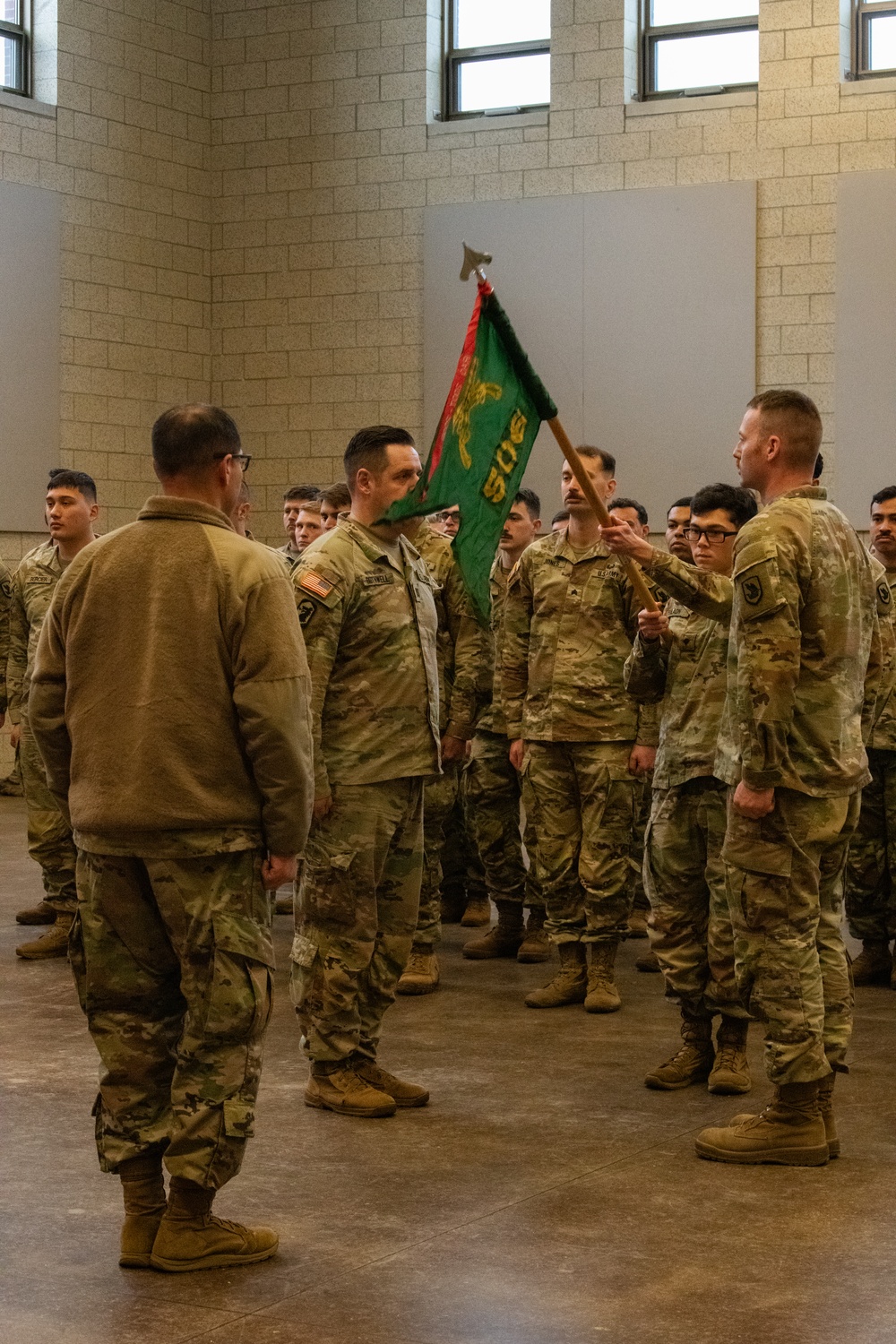 Uncasing the Colors: Washington National Guard military police detachment returns from Spartan Shield deployment.