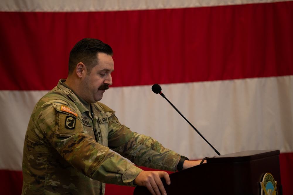 Uncasing the Colors: Washington National Guard military police detachment returns from Spartan Shield deployment.