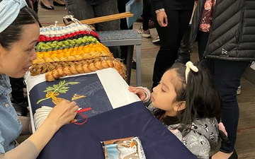 Defense Logistics Agency Troop Support gave children an up-close look at flag making during Take Our Daughters and Sons to Work Day on April 25.