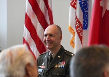 Lt. Gen. Robert Harter promotes Brig. Gen. Mitchell Wisniewski