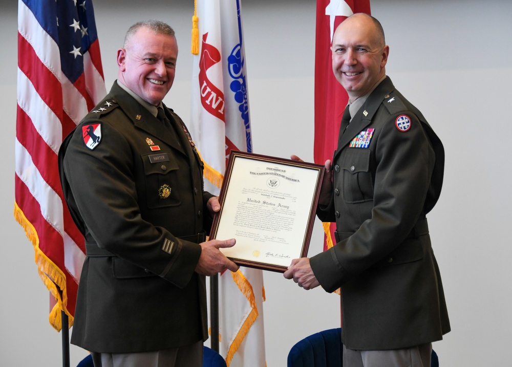 Lt. Gen. Robert Harter promotes Brig. Gen. Mitchell Wisniewski