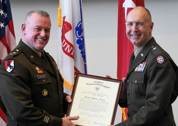 Lt. Gen. Robert Harter promotes Brig. Gen. Mitchell Wisniewski
