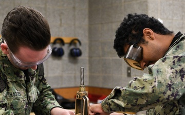 Accession-level Sailors Practice Repacking Valves