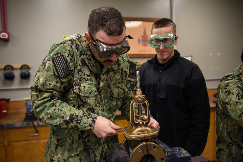 Accession-level Sailors Practice Repacking Valves