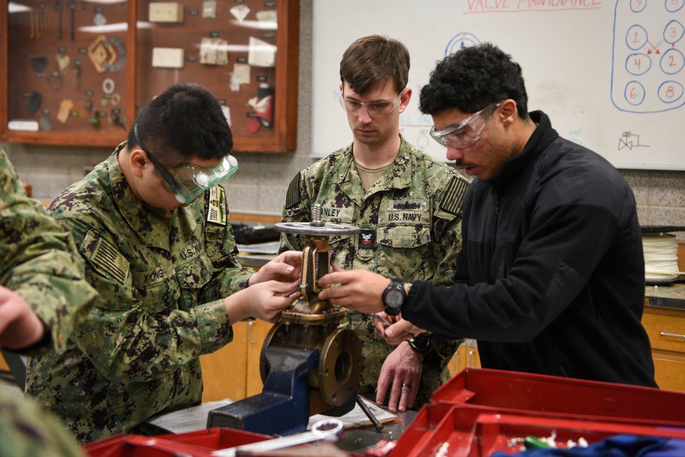 Accession-level Sailors Practice Repacking Valves