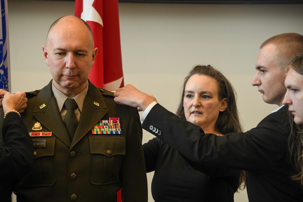 Brig. Gen. Mitchell Wisniewski's family pins new rank during promotion ceremony