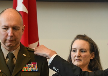 Brig. Gen. Mitchell Wisniewski's family pins new rank during promotion ceremony