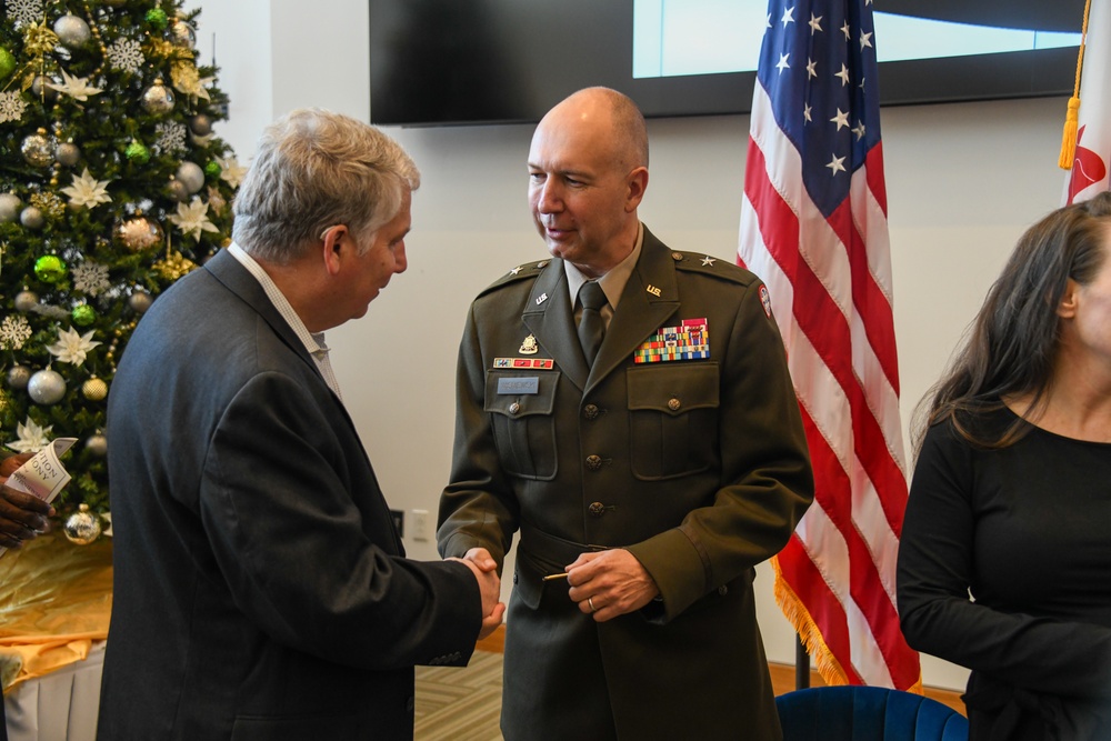 Brig. Gen. Mitchell Wisniewski's family pins new rank during promotion ceremony