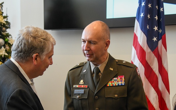 Brig. Gen. Mitchell Wisniewski's family pins new rank during promotion ceremony