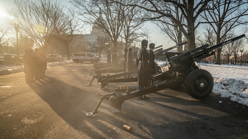 The Presidential Salute Battery fire a 21-Gun Salute during a rehearsal for the 60th Presidential Inauguration