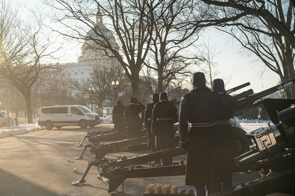 The Presidential Salute Battery fire a 21-Gun Salute during a rehearsal for the 60th Presidential Inauguration