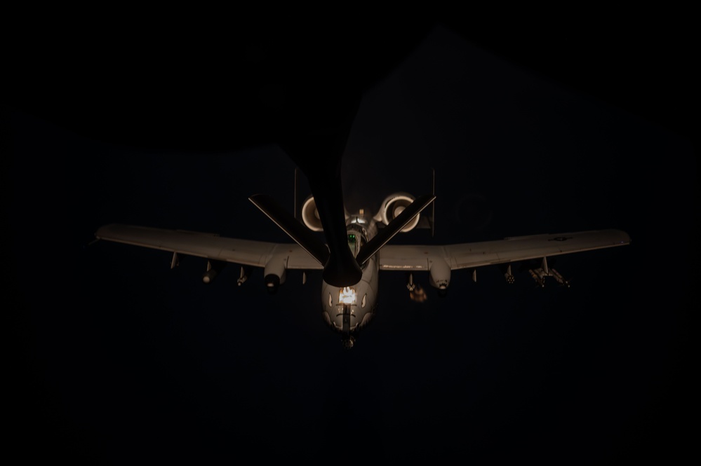 KC-135 Stratotanker conducts aerial refueling mission in stormy skies over USCENTCOM AOR