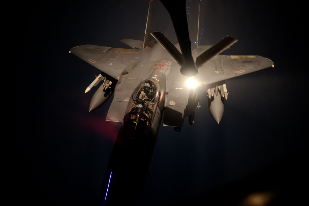 KC-135 Stratotanker conducts aerial refueling mission in stormy skies over USCENTCOM AOR