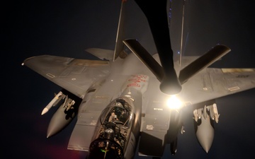 KC-135 Stratotanker conducts aerial refueling mission in stormy skies over USCENTCOM AOR