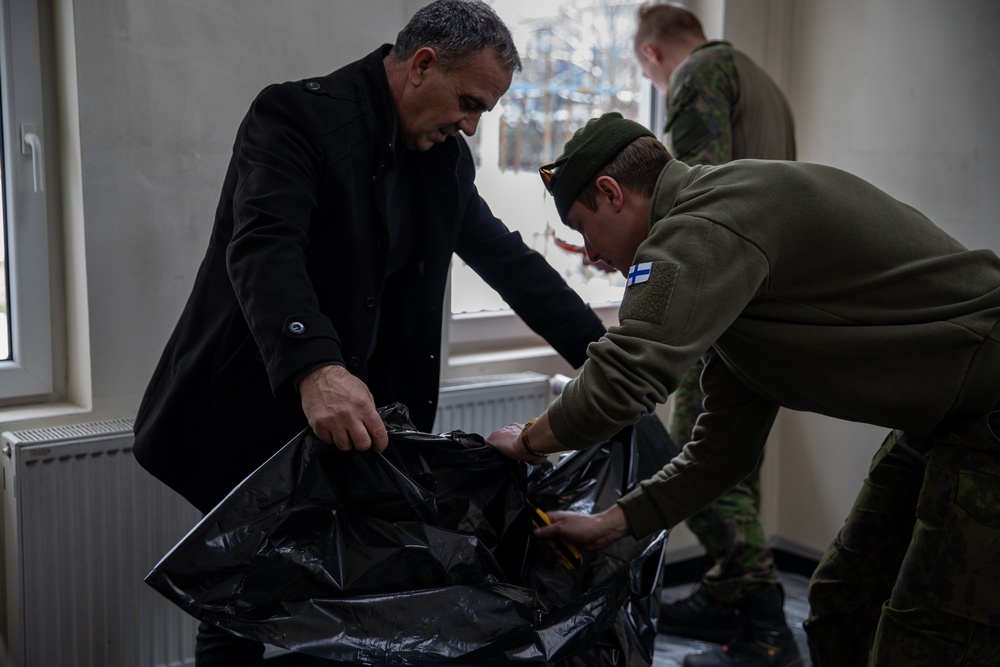 KFOR soldiers participate in a renovation project in Northern Kosovo