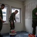 KFOR soldiers participate in a renovation project in Northern Kosovo