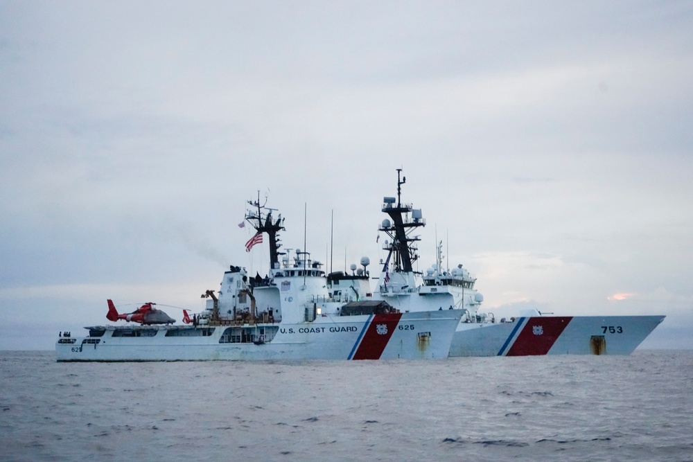 Coast Guard Cutters Venturous and Hamilton rendezvous at sea