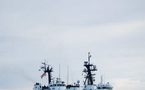 Coast Guard Cutters Venturous and Hamilton rendezvous at sea