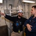 Contractors conduct equipment assessments on the USS Ronald Reagan (CVN 76)