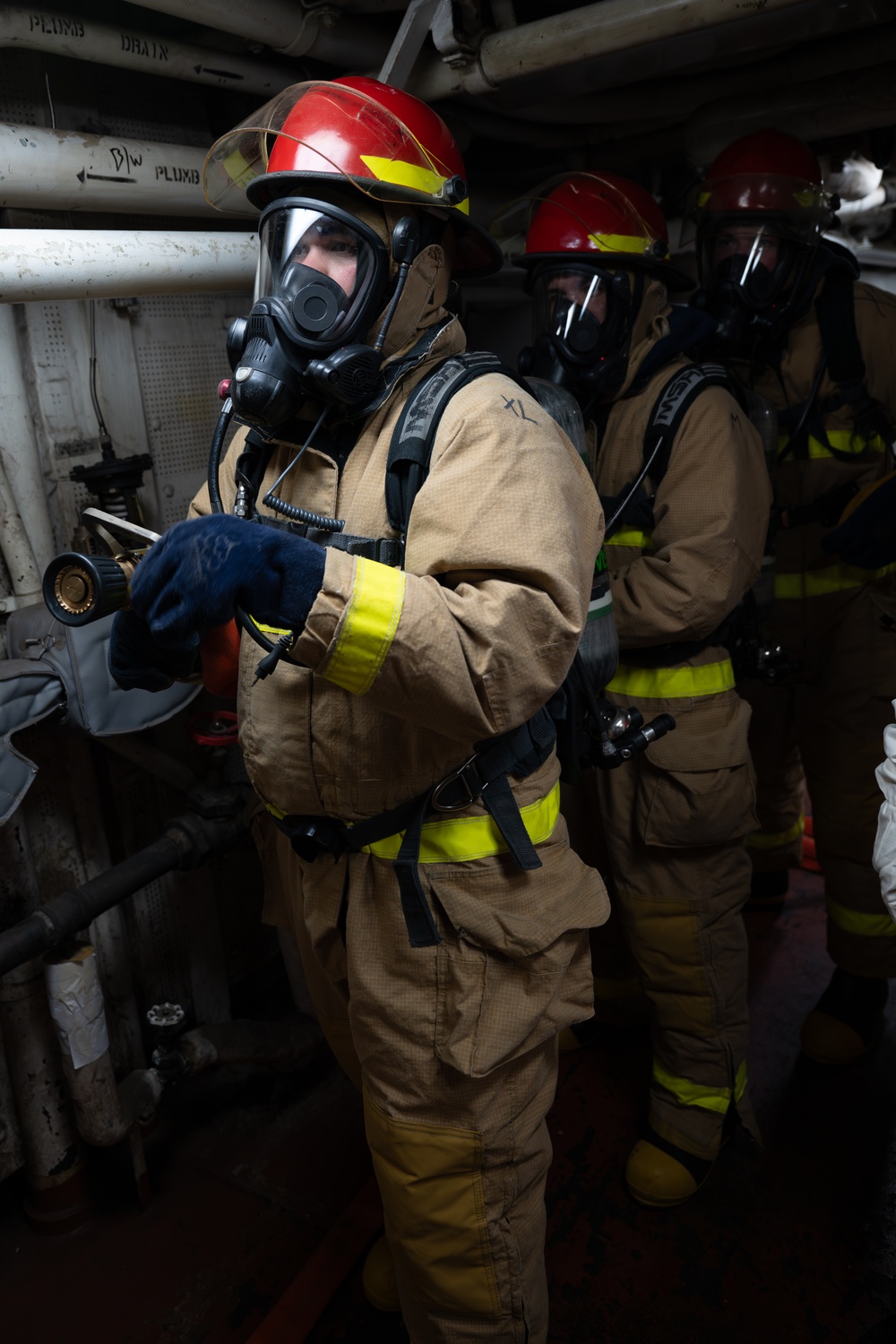 USCGC Polar Star (WAGB 10) crewmembers conduct damage control training in McMurdo Sound during Operation Deep Freeze