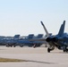 30 F/A-18 Super Hornets from Naval Air Station Oceana staged at Naval Air Station Jacksonville for a flyover honoring former U.S. President Jimmy Carter.