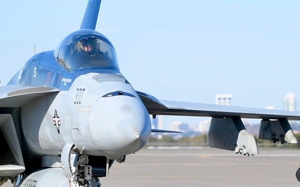 30 F/A-18 Super Hornets from Naval Air Station Oceana staged at Naval Air Station Jacksonville for a flyover honoring former U.S. President Jimmy Carter.