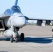 30 F/A-18 Super Hornets from Naval Air Station Oceana staged at Naval Air Station Jacksonville for a flyover honoring former U.S. President Jimmy Carter.