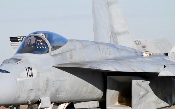 30 F/A-18 Super Hornets from Naval Air Station Oceana staged at Naval Air Station Jacksonville for a flyover honoring former U.S. President Jimmy Carter.