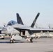 30 F/A-18 Super Hornets from Naval Air Station Oceana staged at Naval Air Station Jacksonville for a flyover honoring former U.S. President Jimmy Carter.