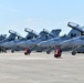 F/A-18 Super Hornets from Naval Air Station Oceana were staged at Naval Air Station Jacksonville for a flyover honoring former U.S. President Jimmy Carter