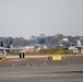 30 F/A-18 Super Hornets from Naval Air Station Oceana staged at Naval Air Station Jacksonville for a flyover honoring former U.S. President Jimmy Carter.