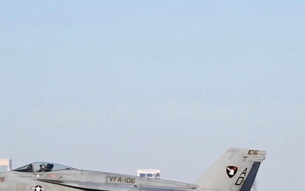 30 F/A-18 Super Hornets from Naval Air Station Oceana staged at Naval Air Station Jacksonville for a flyover honoring former U.S. President Jimmy Carter.