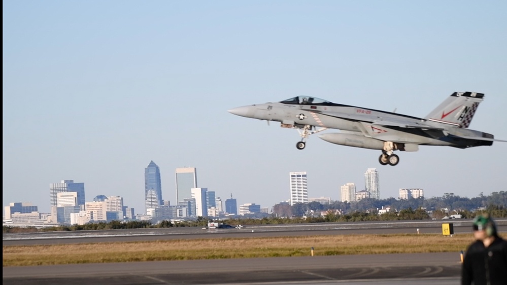 30 F/A-18 Super Hornets from Naval Air Station Oceana staged at Naval Air Station Jacksonville for a flyover honoring former U.S. President Jimmy Carter.