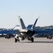 30 F/A-18 Super Hornets from Naval Air Station Oceana staged at Naval Air Station Jacksonville for a flyover honoring former U.S. President Jimmy Carter.