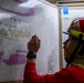 USCGC Polar Star (WAGB 10) crewmembers conduct damage control training in McMurdo Sound during Operation Deep Freeze