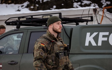 KFOR German and Latvian Soldiers conduct routine patrols in Mitrovica, Kosovo