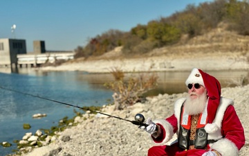 Santa Claus fishing and wearing life jacket at USACE project site