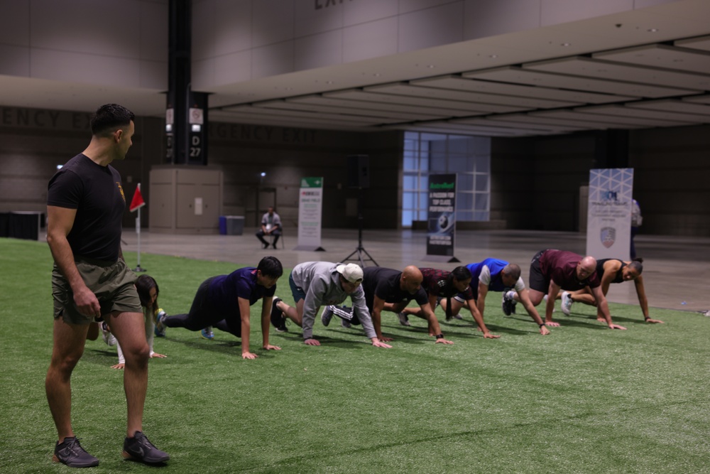 Coaches Participate in “Fit To Win” Workout