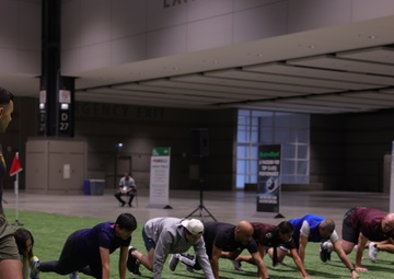 Coaches Participate in “Fit To Win” Workout