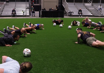 Coaches Participate in “Fit To Win” Workout