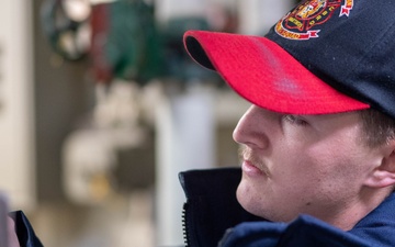 USS Ronald Reagan (CVN 76) Sailors check damage control equipment