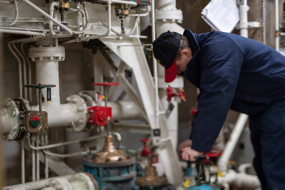 USS Ronald Reagan (CVN 76) Sailors check damage control equipment