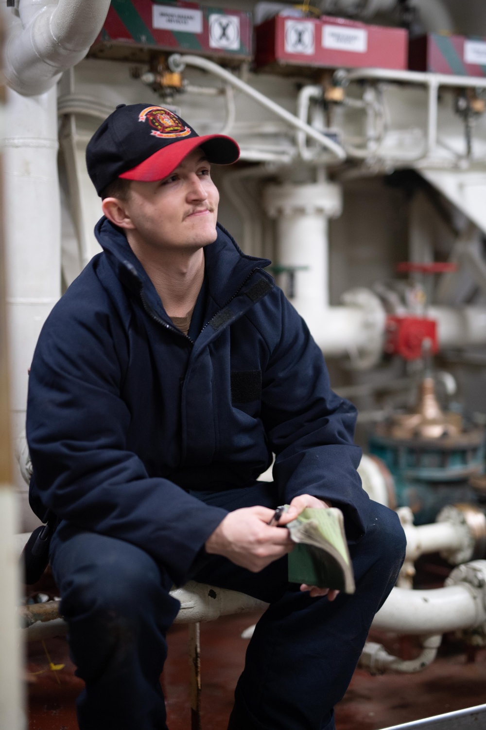 USS Ronald Reagan (CVN 76) Sailors check damage control equipment